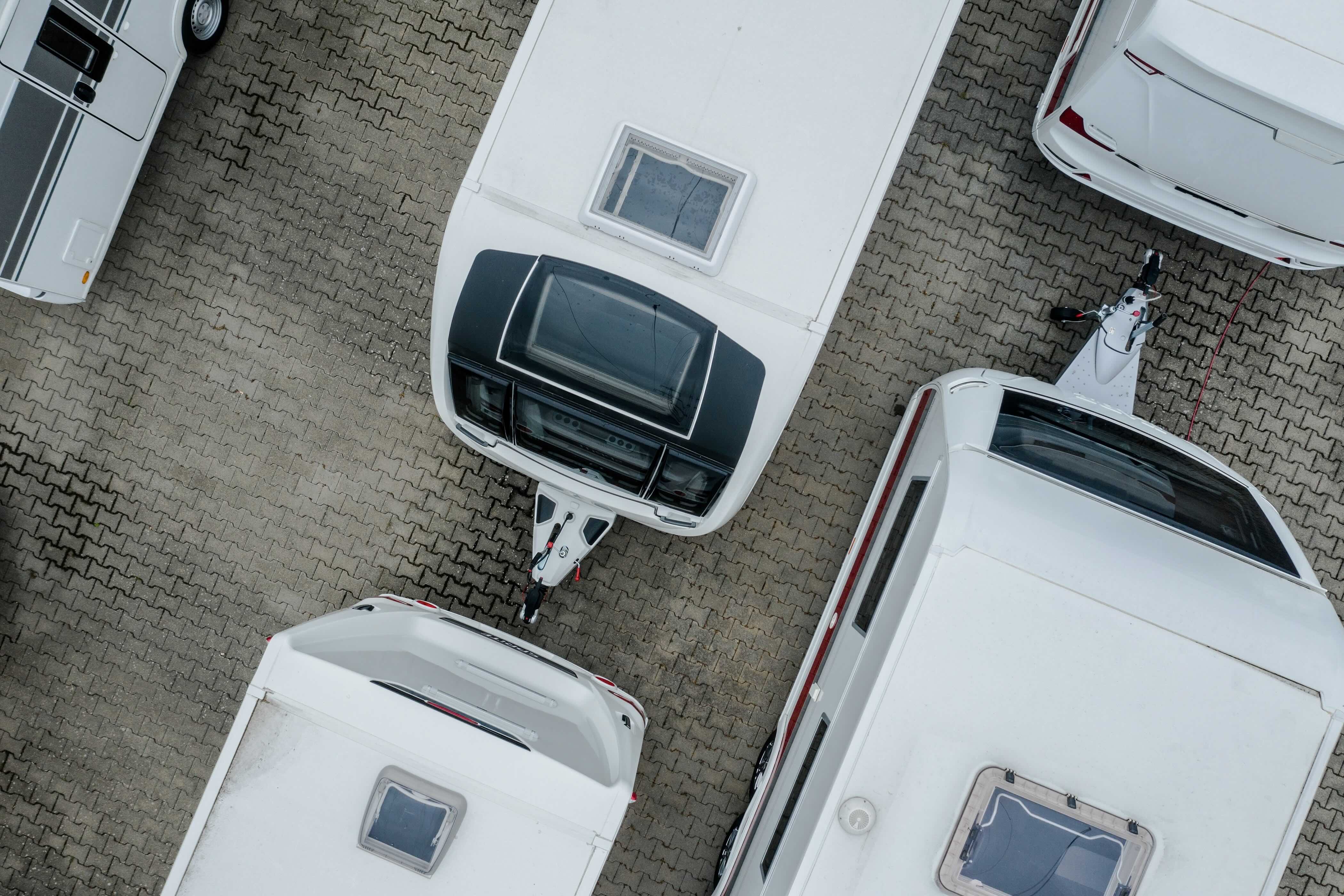 Multiple RV's parked in a lot