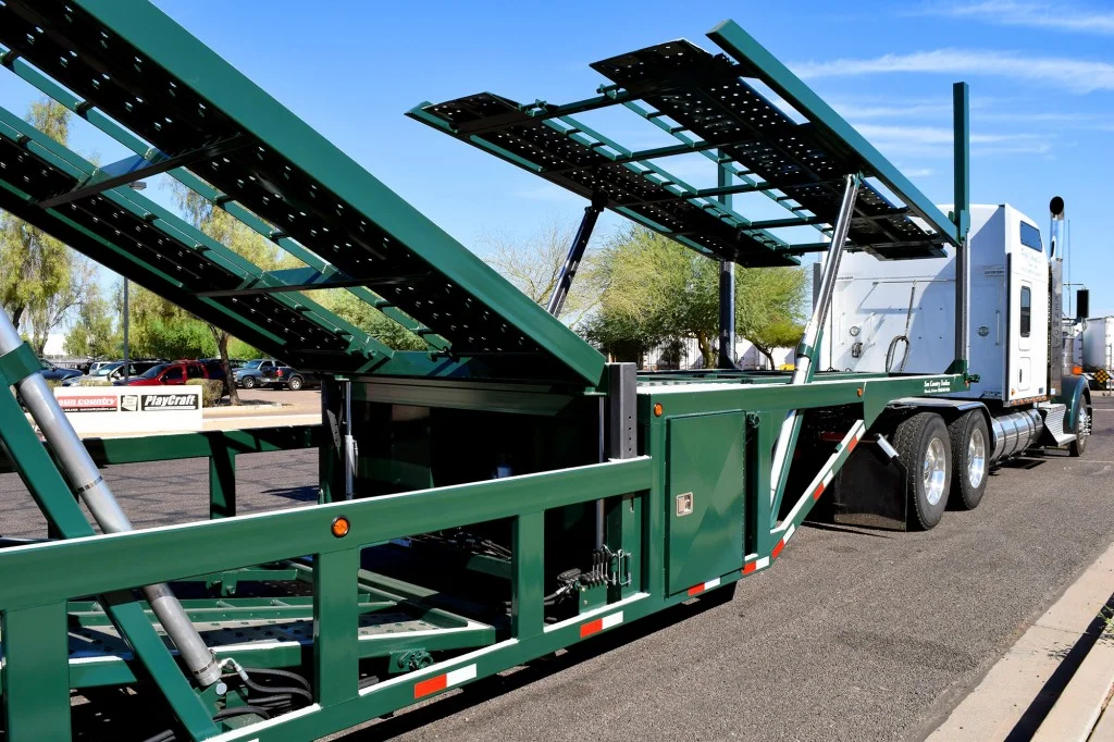 Premium 5-car auto-hauler trailer loaded with vehicles